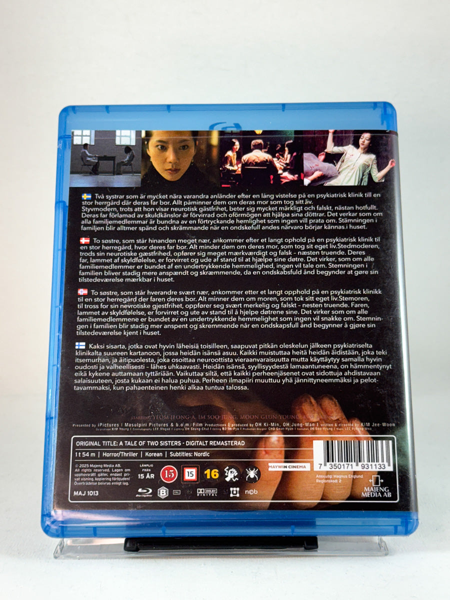 Bakside av Blu-ray-cover til A Tale of Two Sisters – stemningsfull psykologisk horror med prisvinnende regi, Blu-ray hos Brukbar Film.