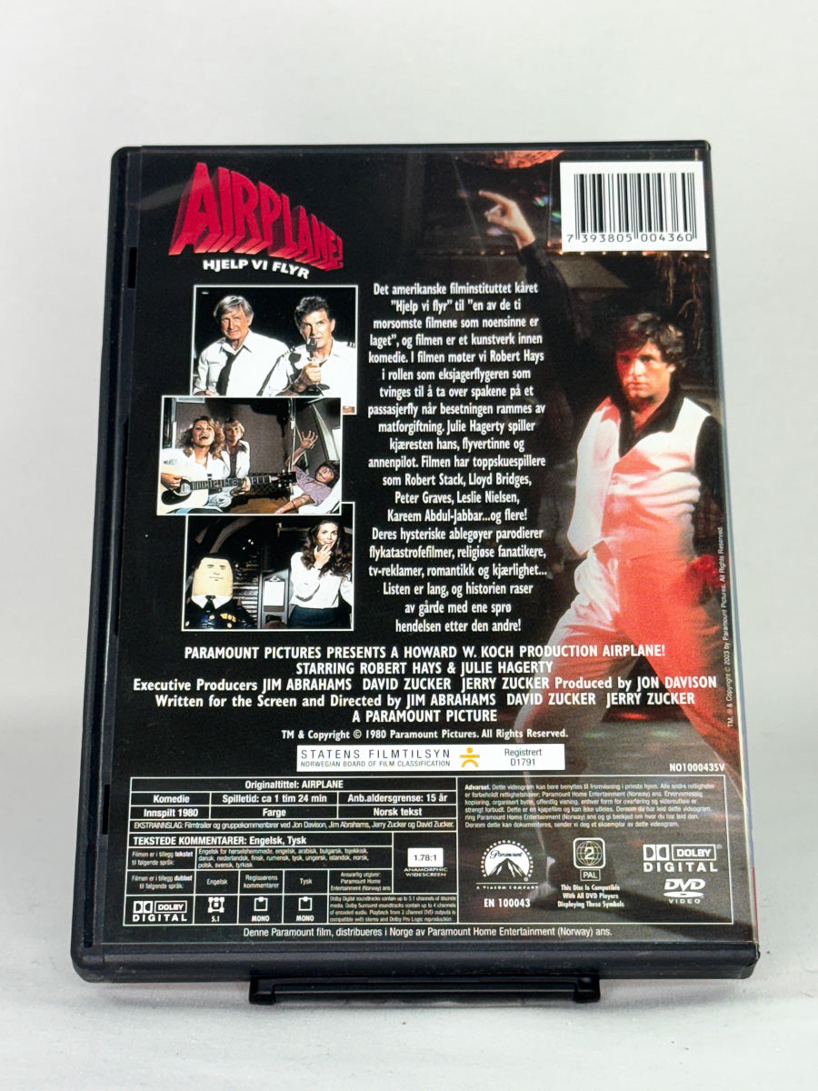 DVD-bakside til filmen Airplane! - Hjelp vi flyr
Baksiden viser info, spesifikasjoner og eventuell ekstratekst – produktbilde fra nettbutikken Brukbar Film