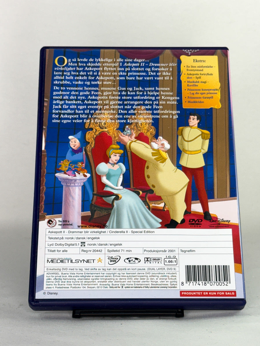 DVD-bakside til filmen Askepott II – Drømmer blir virkelighet
Baksiden viser info, spesifikasjoner og eventuell ekstratekst – produktbilde fra nettbutikken Brukbar Film
