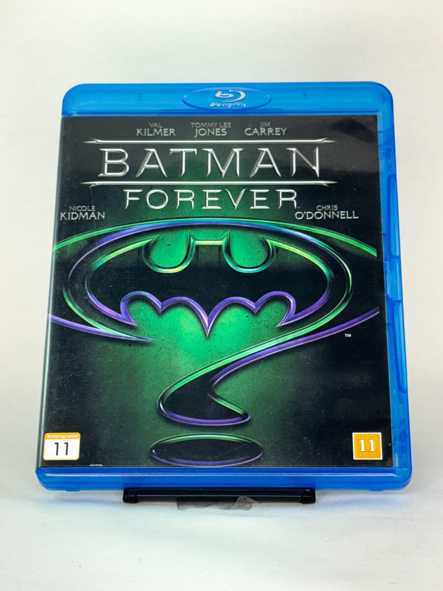 Forside av Blu-ray-coveret til Batman Forever – fargerik superheltfilm med Val Kilmer som Batman, brukt originalfilm hos Brukbar Film