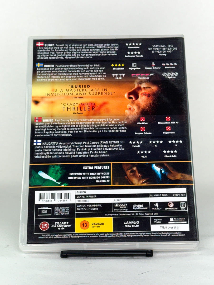 Bakside av Buried – klaustrofobisk spenningsfilm med kritikerros, brukt DVD fra Brukbar Film.