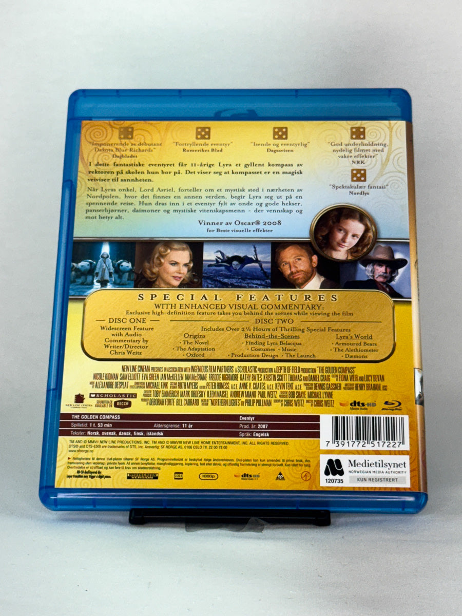 Bakside av Blu-ray-cover for Det gylne kompasset – brukt Blu-ray-film i original fantasyutgave, tilgjengelig hos Brukbar Film.