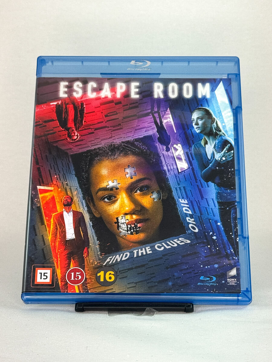 Forside av Escape Room Blu-ray-cover – brukt thriller hvor gåtene kan bety liv eller død, hos Brukbar Film