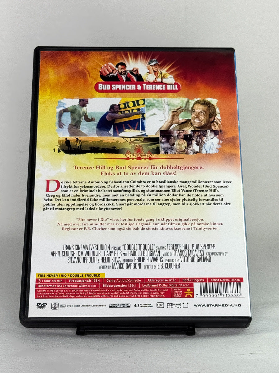 Bakside av Fire i Rio – humor, action og 80-tallssjarm fra den legendariske duoen, brukt DVD fra Brukbar Film.