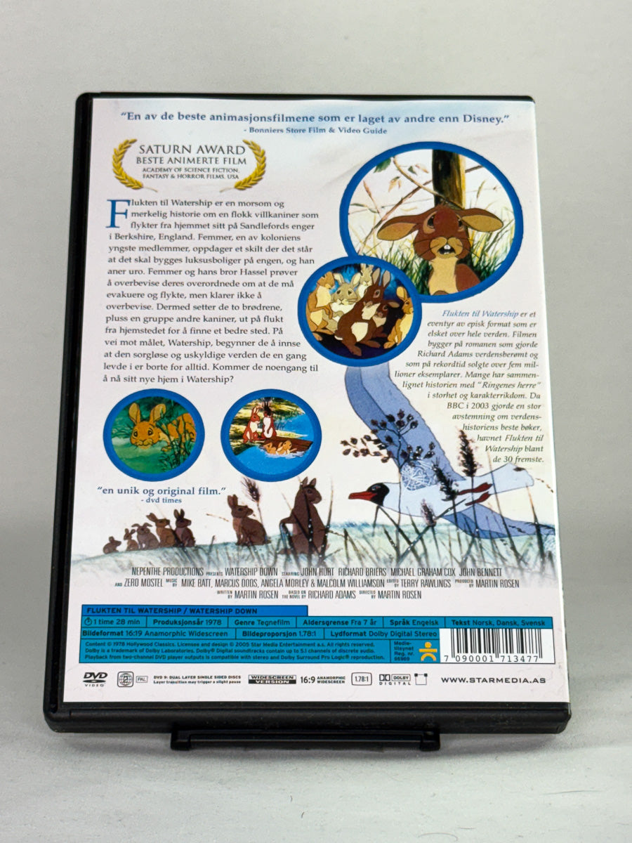 Bakside av DVD Flukten til Watership – brukt animasjonsklassiker på original DVD, tilgjengelig hos Brukbar Film