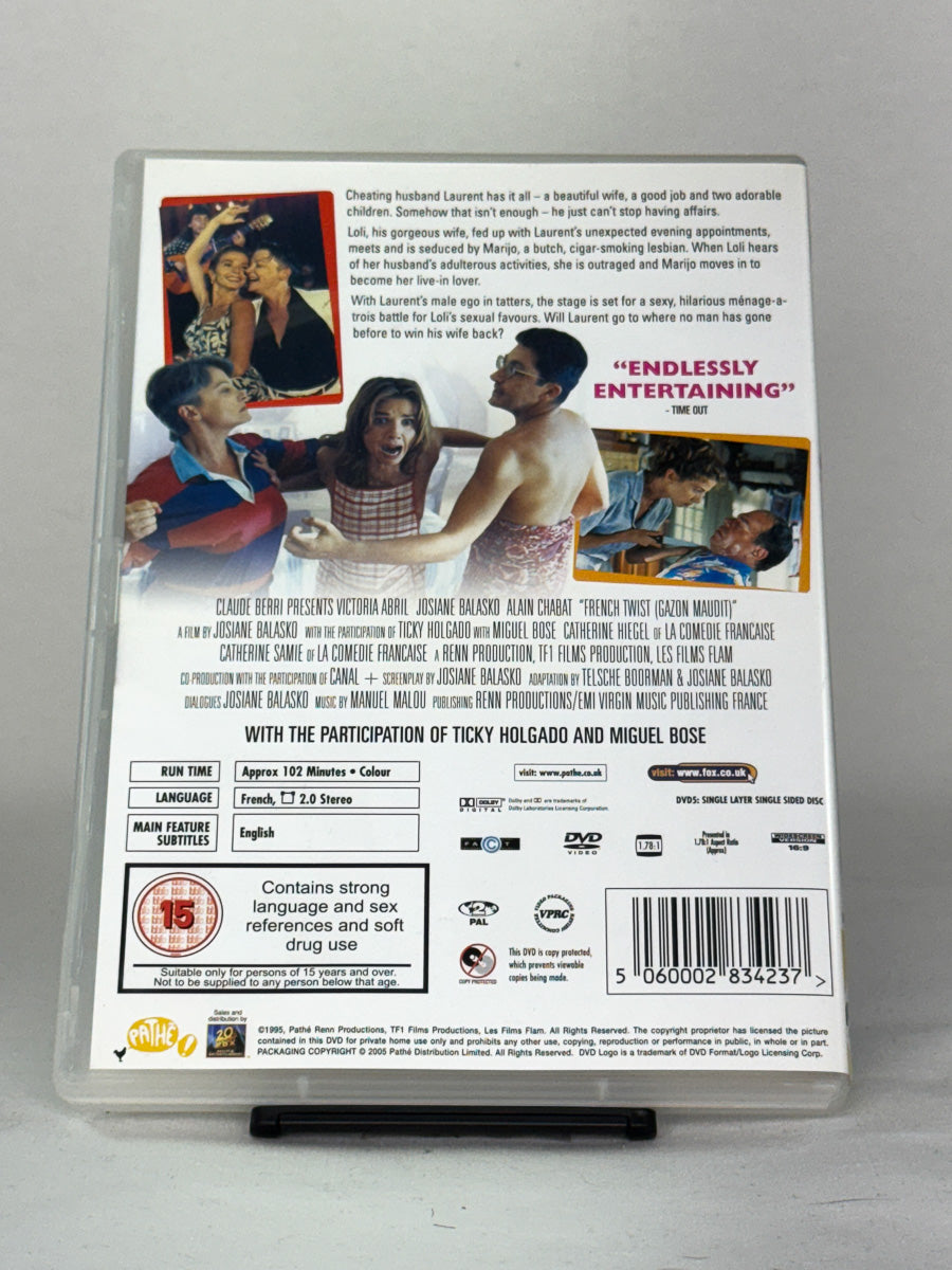 Bakside av French Twist – prisbelønt og sjarmerende kjærlighetstriangel med humor og varme, brukt DVD fra Brukbar Film.