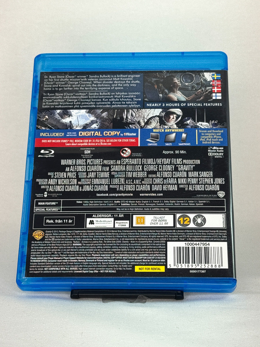 Bakside av Blu-ray-cover til Gravity – prisbelønt sci-fi-drama om overlevelse i verdensrommet, brukt Blu-ray-utgave hos Brukbar Film.