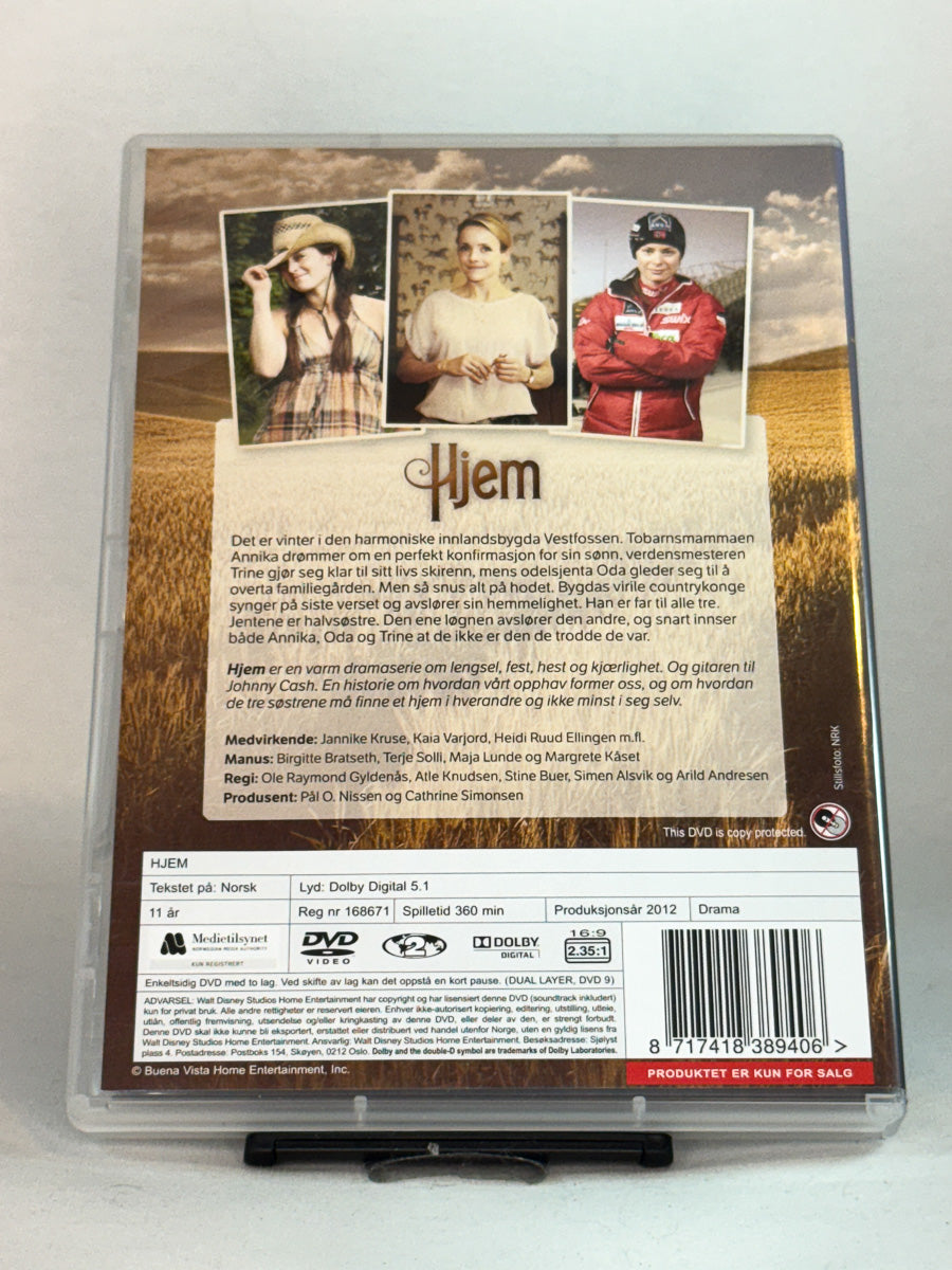 Bakside av DVD-cover til Hjem – Sesong 1 – første sesong med sterke kvinnelige karakterer og småbydrama, brukt originalserie på DVD hos Brukbar Film.