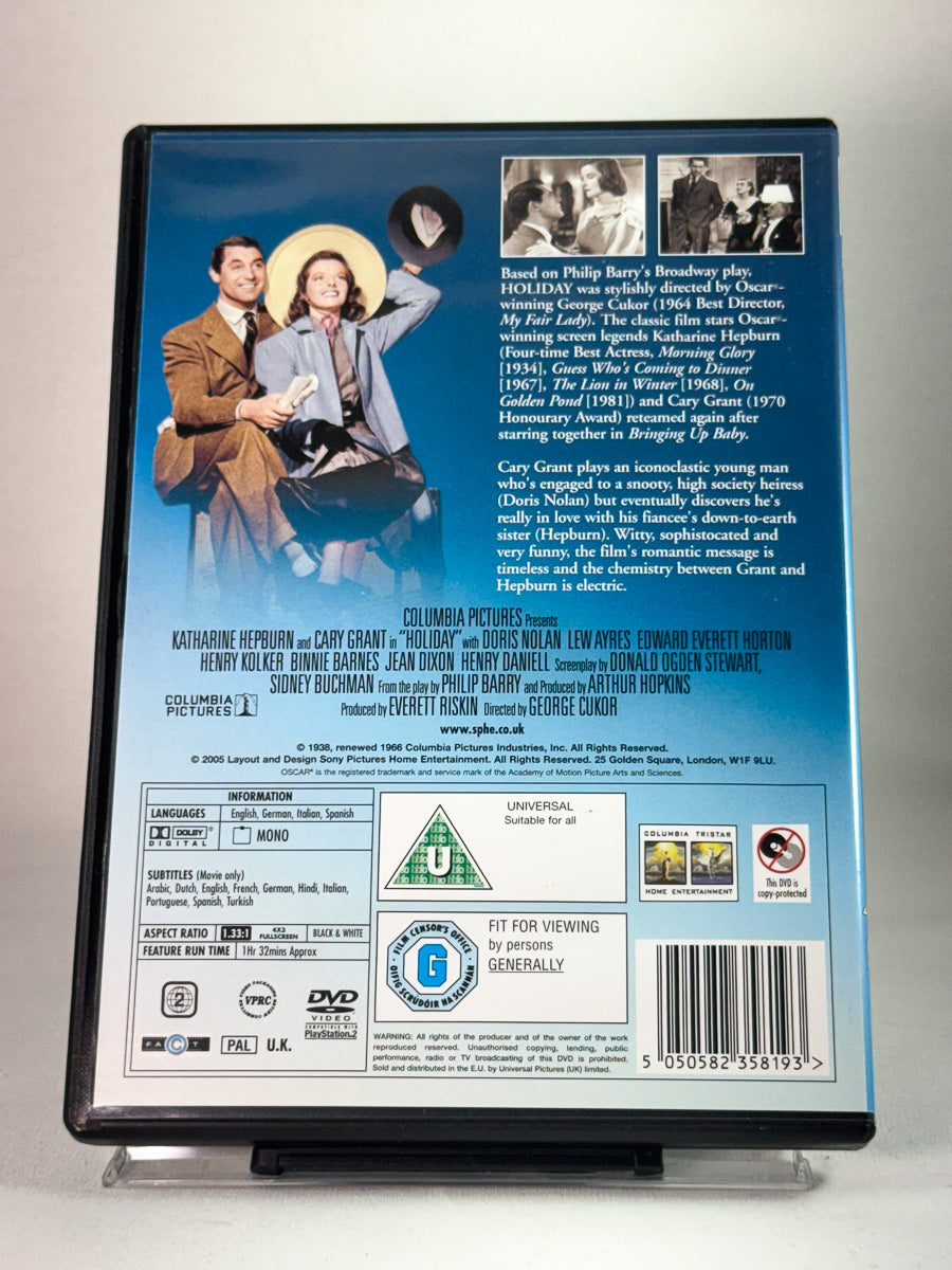 Bakside av DVD-cover til Holiday, bruktfilm hos nettbutikken Brukbar Film