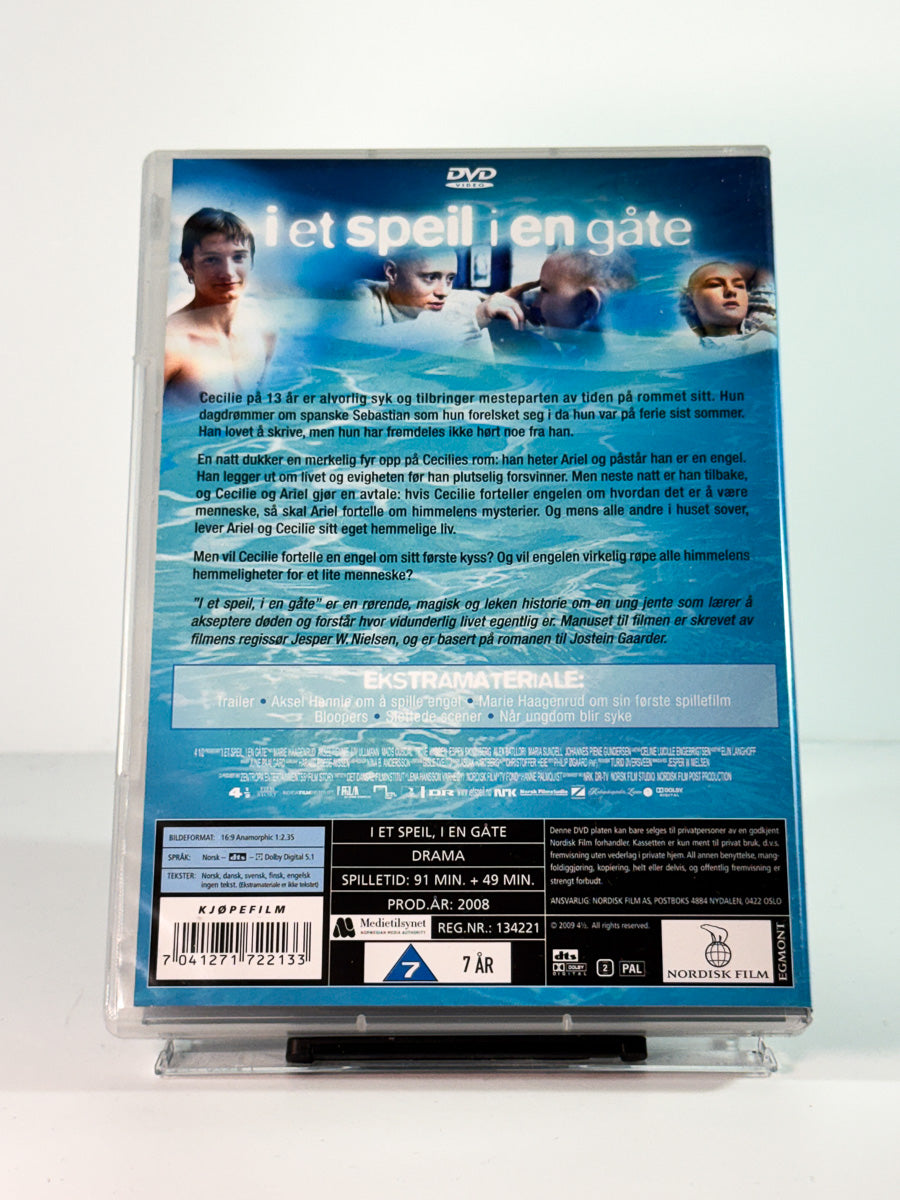 Bakside av cover til i et speil i en gåte, brukt original DVD hos Brukbar Film