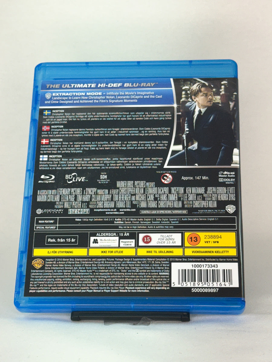 Bakside av Blu-ray-cover for Inception – informasjon om bonusmateriale, lydformater og språk, brukt Blu-ray hos Brukbar Film.