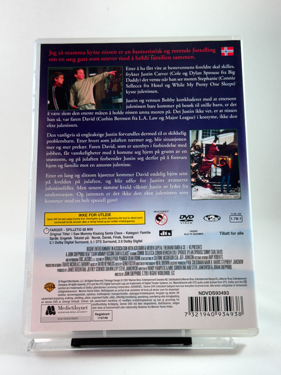 Bakside av DVD-cover til Jeg så mamma kysse nissen, brukt originalfilm på DVD hos Brukbar Film