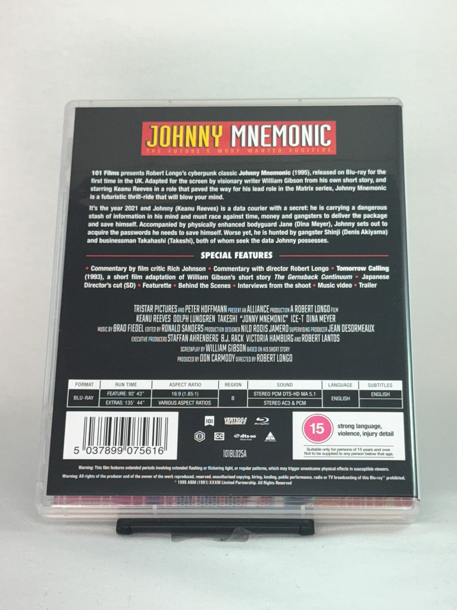 Bakside av Blu-ray-cover til Johnny Mnemonic – futuristisk thriller basert på William Gibsons novelle, brukt originalfilm på Blu-ray hos Brukbar Film.