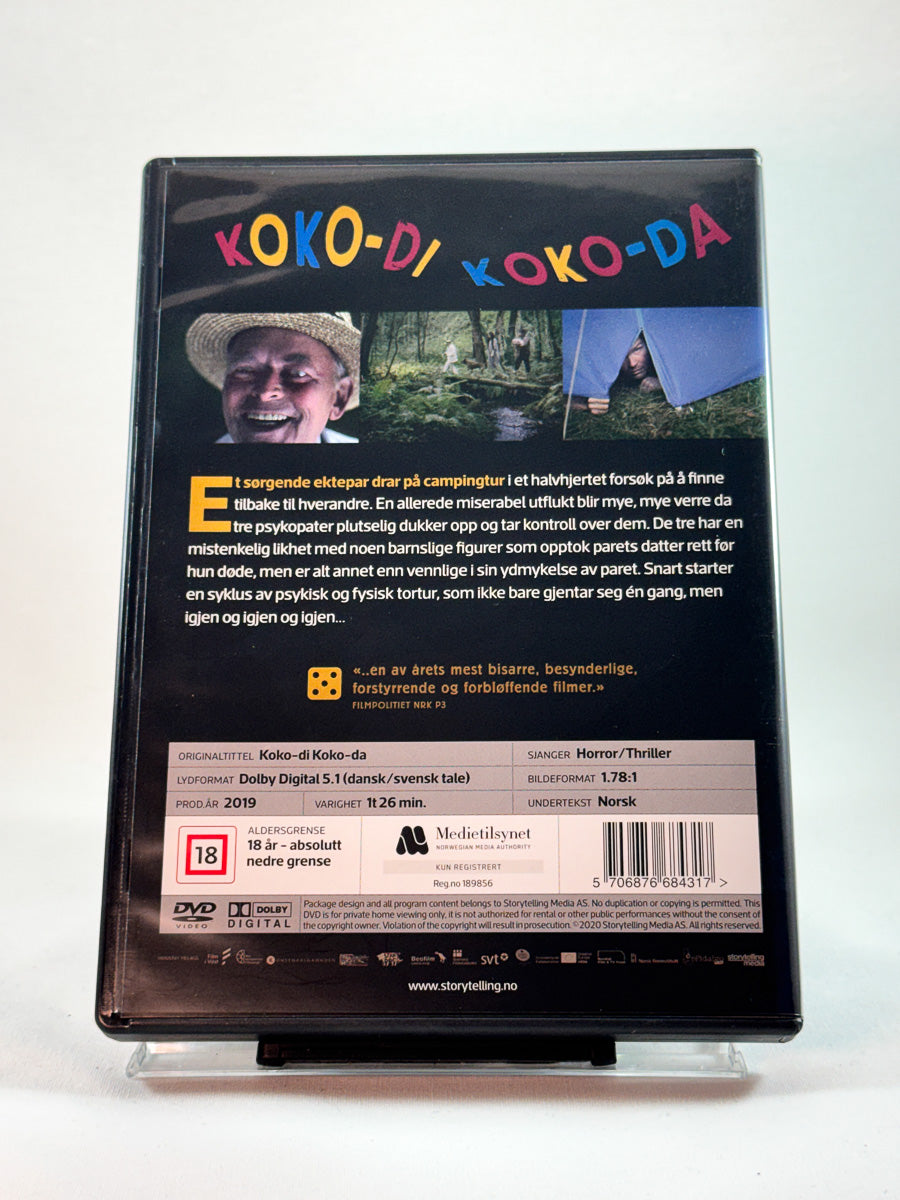 Bakside av cover til Koko-di Koko-da, bruktfilm hos nettbutikken Brukbar Film