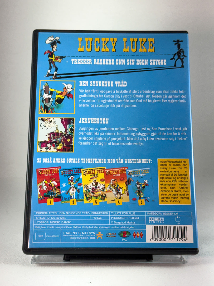 Bakside av DVD-cover til Lucky Luke – Den syngende tråd, brukt DVD med episodetekster og teknisk info hos Brukbar Film