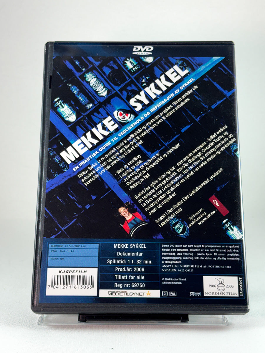 Bakside av DVD-cover til Mekke sykkel, brukt instruksjons-DVD om vedlikehold og reparasjon hos Brukbar Film