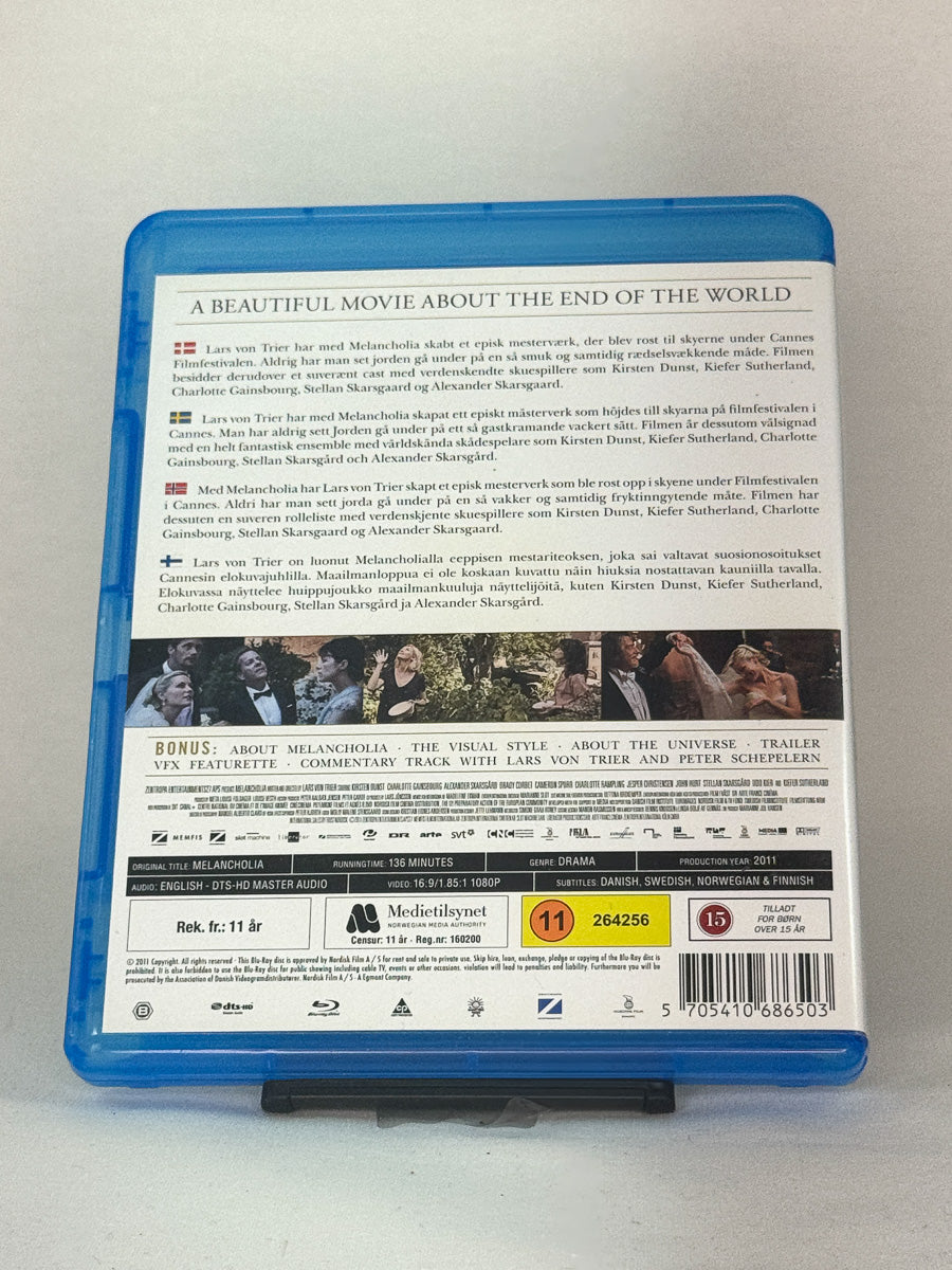 Bakside av Blu-ray-cover for Melancholia – filmomtale, priser og teknisk informasjon, brukt film hos Brukbar Film.