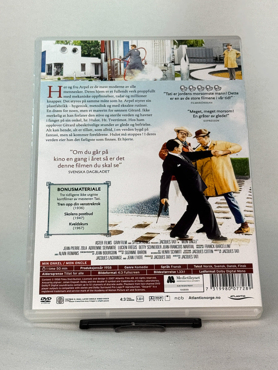 Bakside av DVD-cover til Min onkel – Jacques Tatis satiriske mesterverk om modernitet og menneskelighet, original brukt DVD-utgave tilgjengelig hos Brukbar Film.