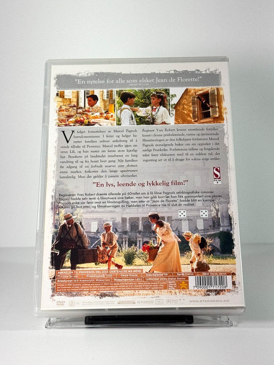 Bakside av cover til Nøkkelen til Provence II – Min mors slott, bruktfilm på DVD hos Brukbar Film