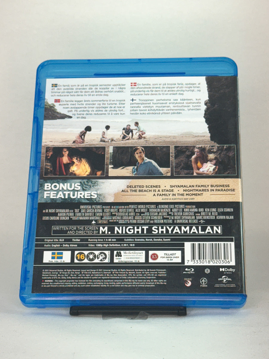 Bakside av Blu-ray-cover for filmen Old – brukt thrillerfilm på Blu-ray, originalt omslag tilgjengelig hos Brukbar Film