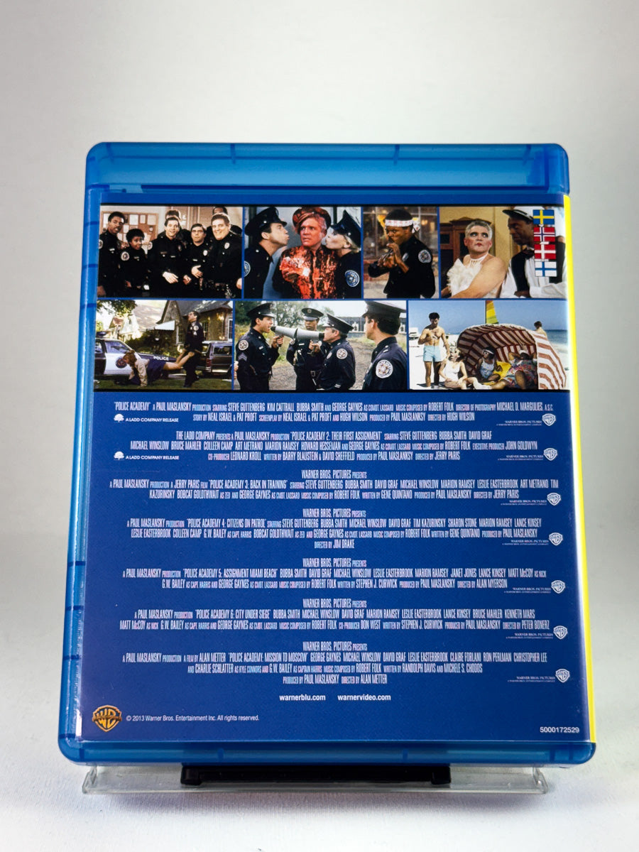 Bakside av Blu-ray-cover til Police Academy – The Complete Collection, bruktfilm hos nettbutikken Brukbar Film