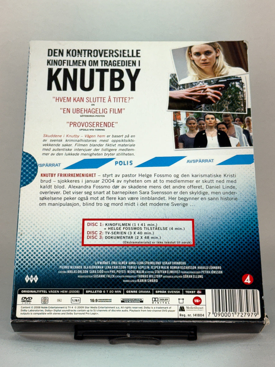 Bakside av DVD-cover til Skuddene i Knutby – inkluderer TV-serien og dokumentarer om synd, skyld og menneskelig mørke, brukt originalutgave på DVD hos Brukbar Film.