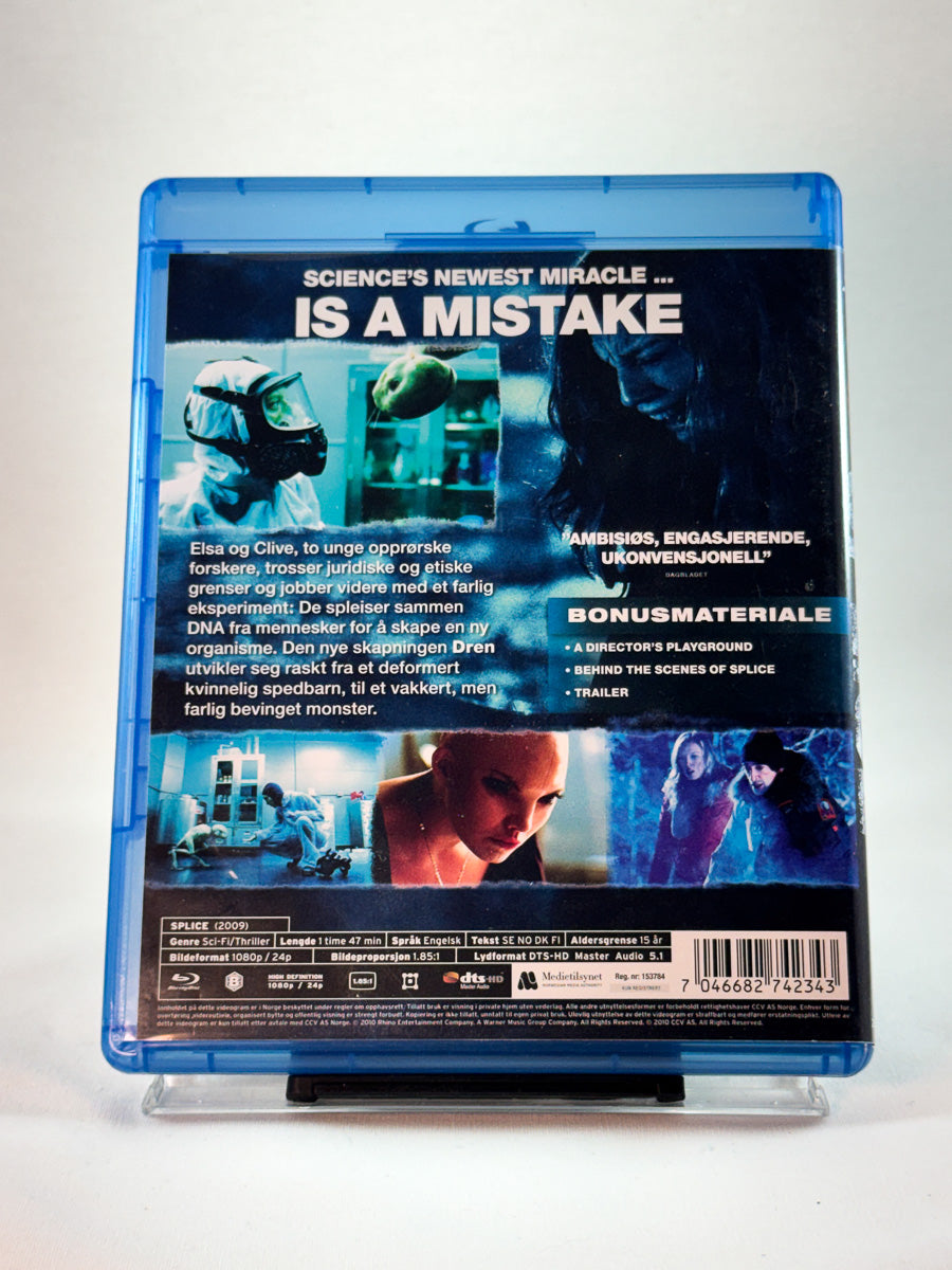 Bakside av cover til Splice, bruktfilm hos nettbutikken Brukbar Film