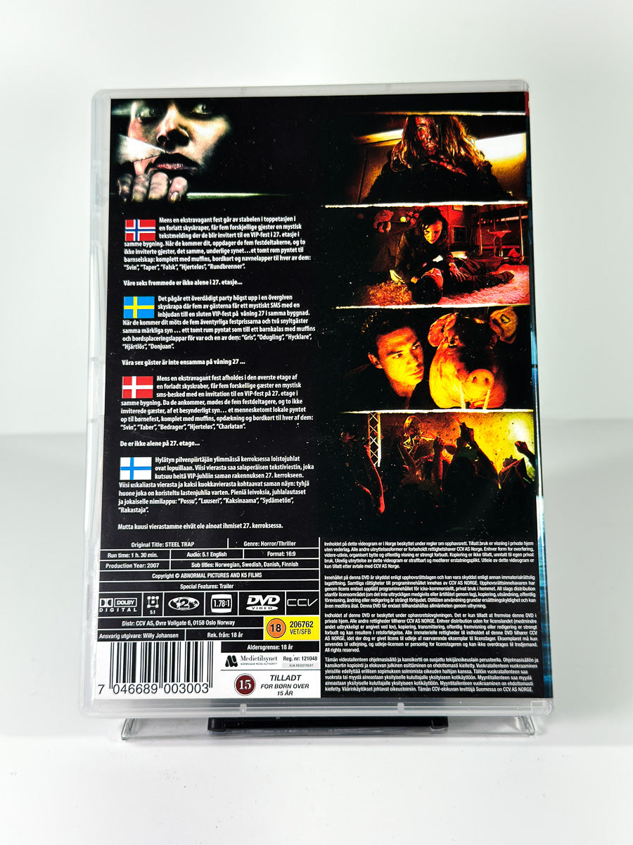 Bakside av cover til Steel Trap, bruktfilm på DVD hos Brukbar Film