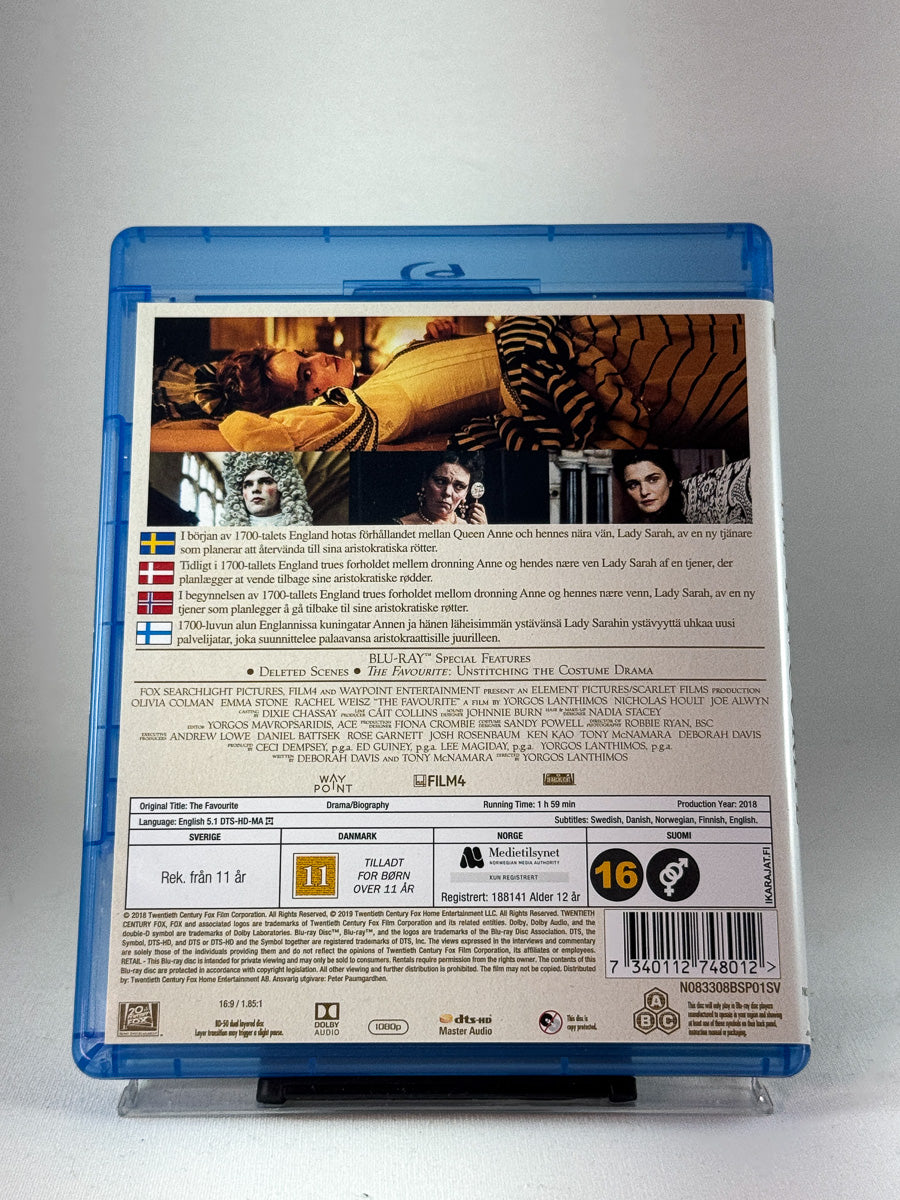 Bakside av Blu-ray-utgaven The Favourite, brukt Blu-ray tilgjengelig hos Brukbar Film