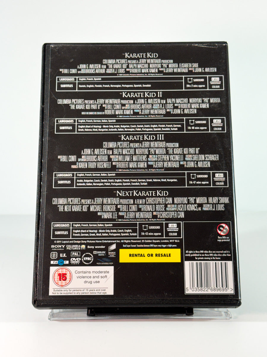 Bakside av cover til the karate kid the movies, brukt original DVD hos Brukbar Film