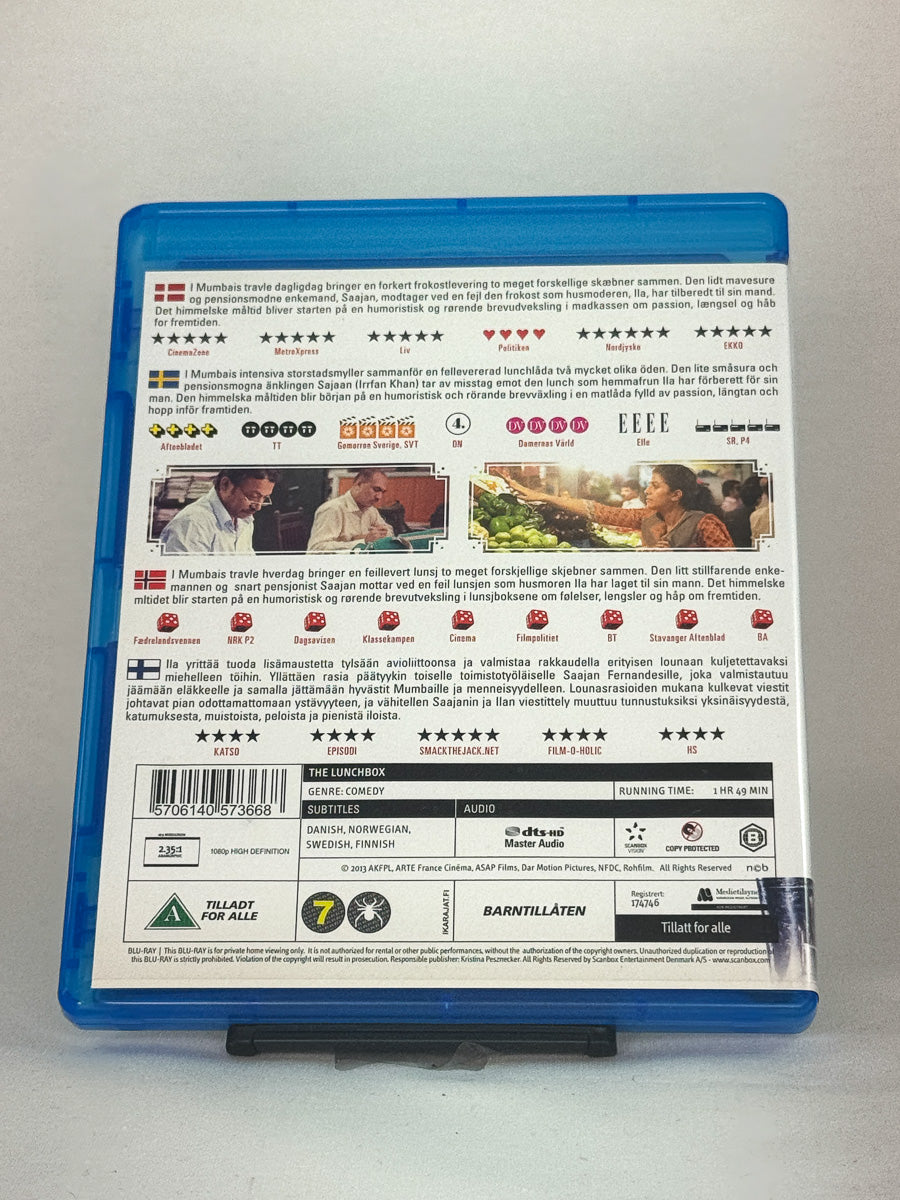 Bakside av Blu-ray-cover for The Lunchbox – festivalpriser og kritikerros, brukt film hos Brukbar Film.