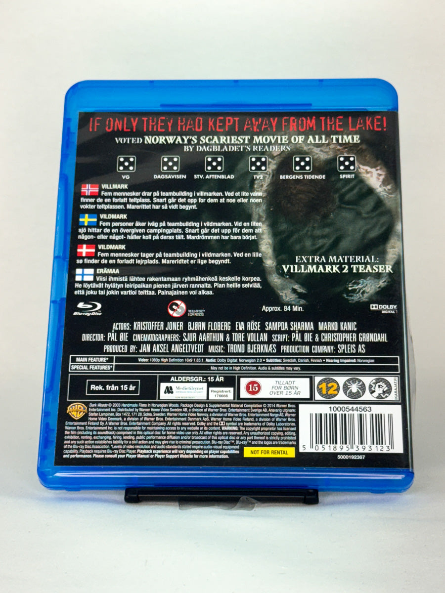 Bakside av Blu-ray-cover for filmen Villmark (Dark Woods) – brukt norsk skrekkfilm på Blu-ray, tilgjengelig hos Brukbar Film