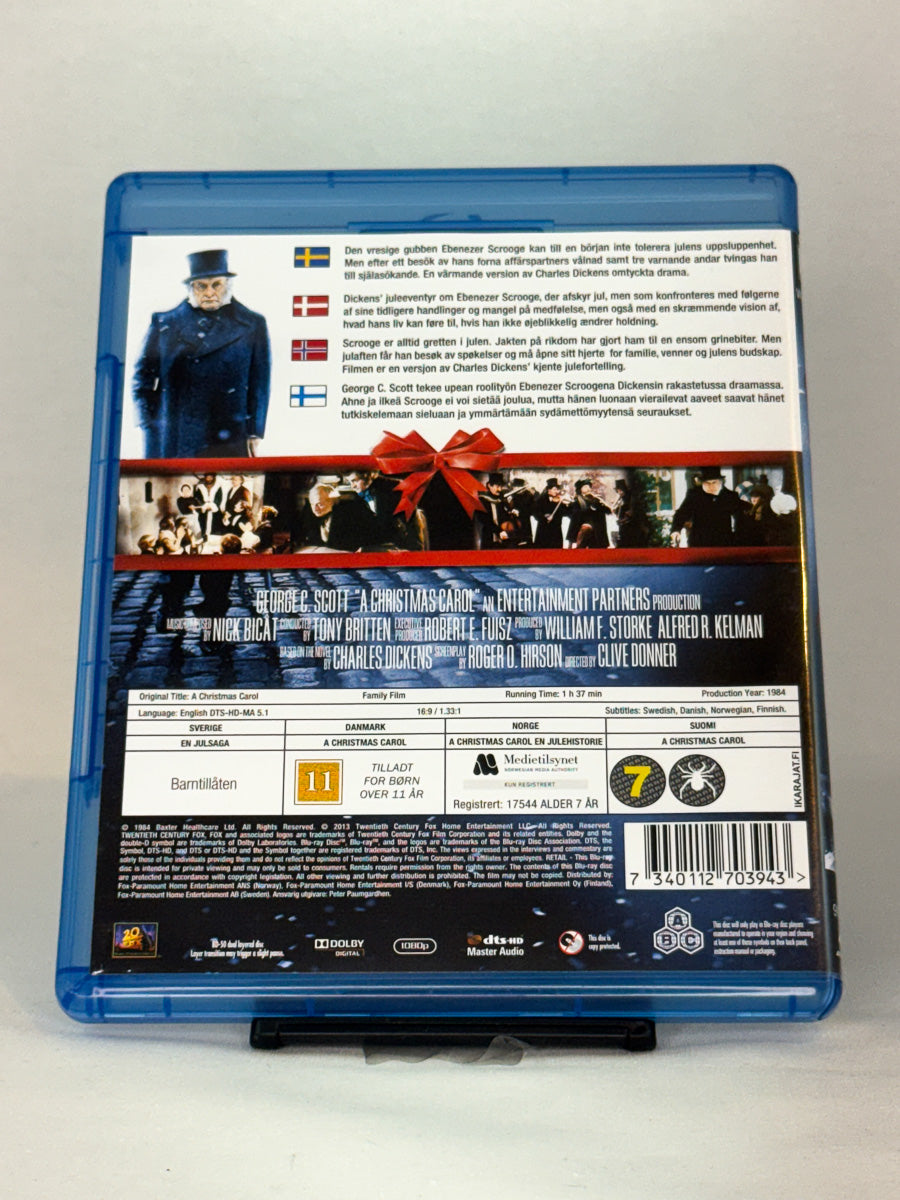 Bakside av Blu-ray-cover til A Christmas Carol – brukt original Blu-ray familiefilm fra Brukbar Film