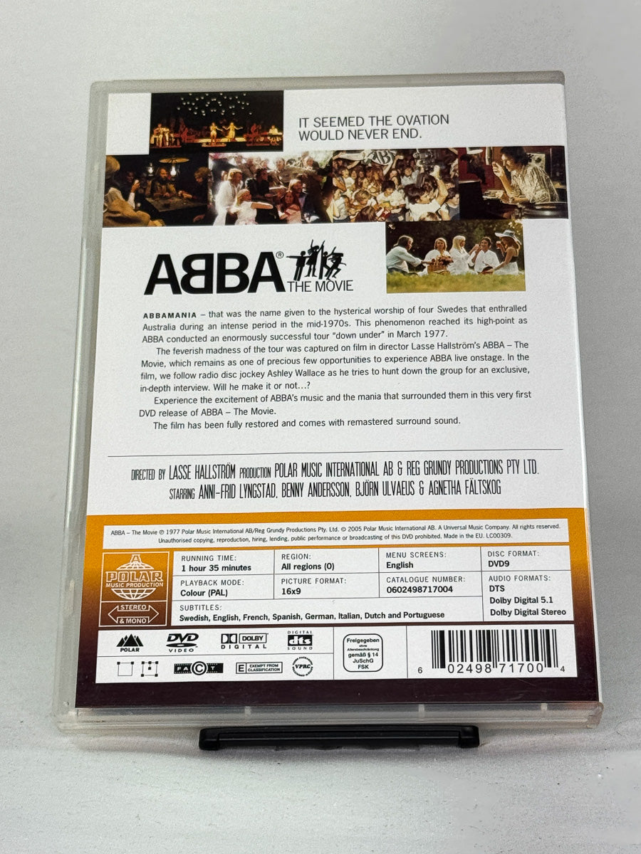 Bakside av DVD-cover til ABBA – The Movie med innhold og ekstramateriale, klassisk 70-talls konsertfilm i brukt DVD-utgave hos Brukbar Film.