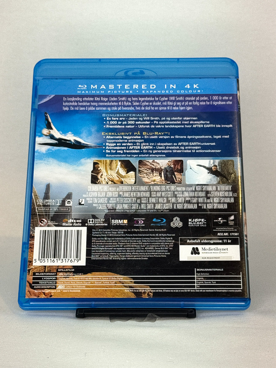 Bakside av Blu-ray-cover for After Earth – brukt original Blu-ray science fiction-film tilgjengelig hos Brukbar Film