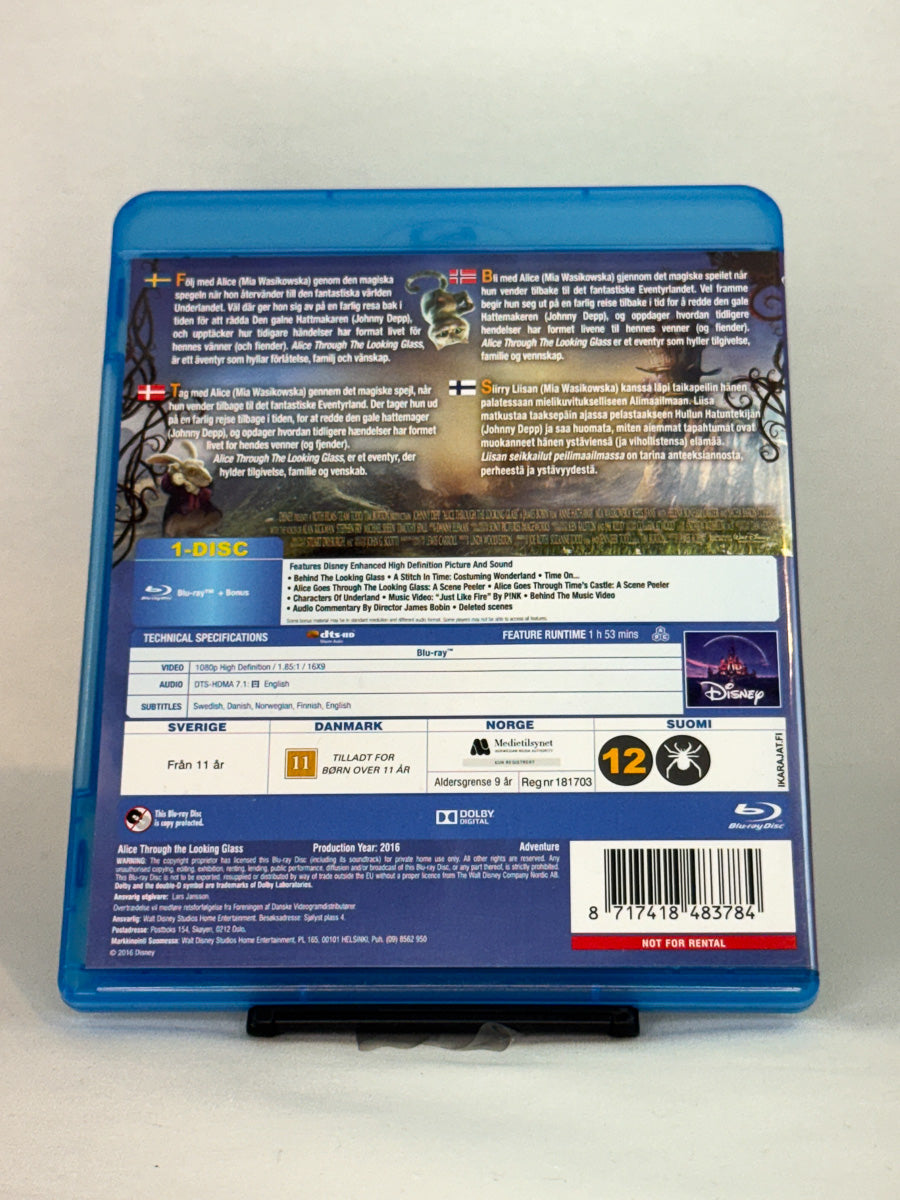 Bakside av Blu-ray-cover for Alice Through the Looking Glass – brukt Disney Blu-ray med spesifikasjoner hos Brukbar Film