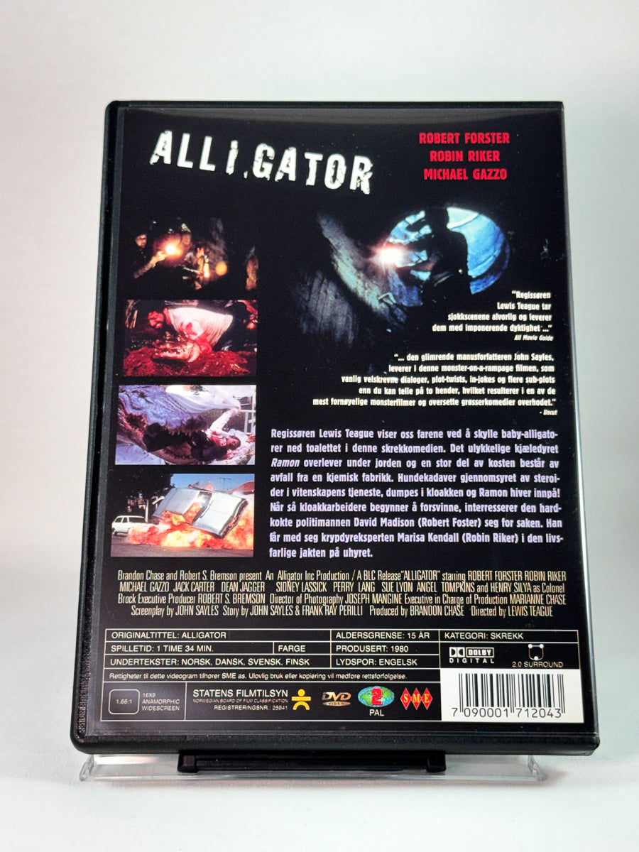 Bakside av cover til Alligator, bruktfilm på DVD hos Brukbar Film