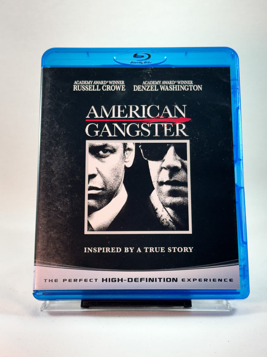 Forside av cover til American Gangster, bruktfilm hos nettbutikken Brukbar Film