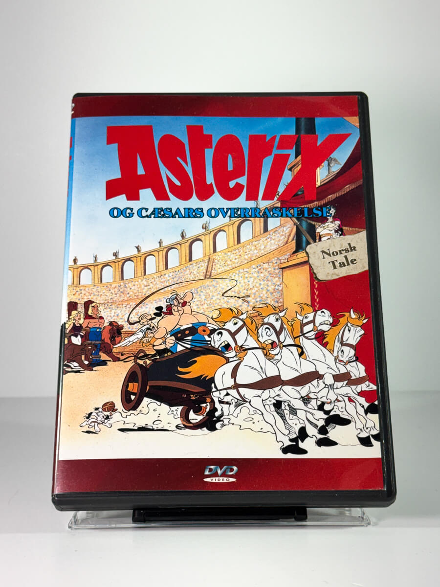 Forside av cover til Asterix og Cæsars overraskelse, bruktfilm hos nettbutikken Brukbar Film