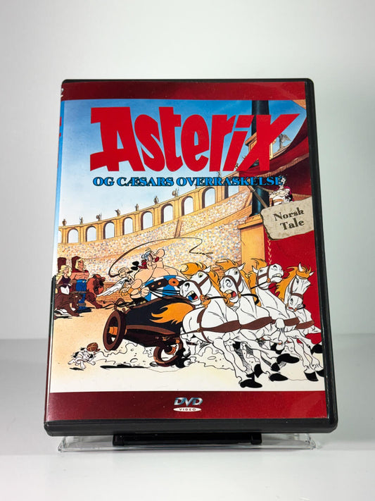 Forside av cover til Asterix og Cæsars overraskelse, bruktfilm hos nettbutikken Brukbar Film