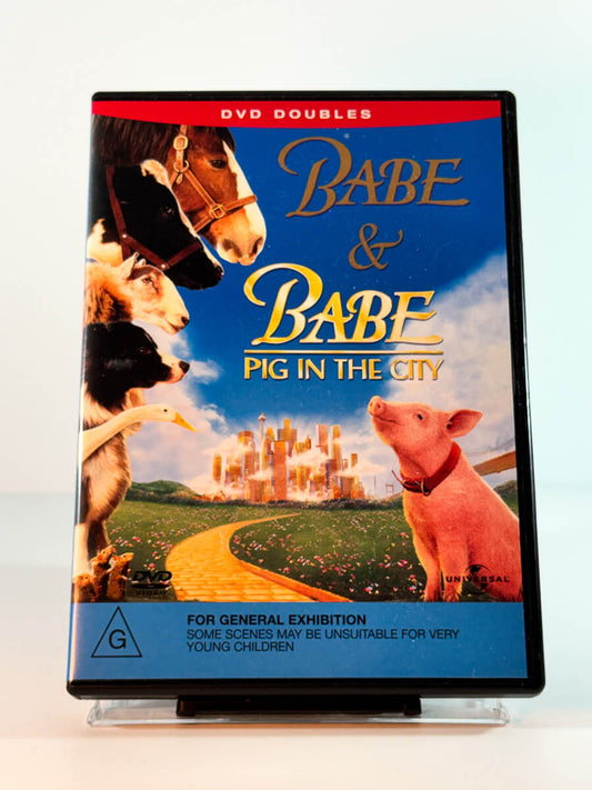 Forside av cover til babe and babe pig in the city, bruktfilm hos nettbutikken Brukbar Film