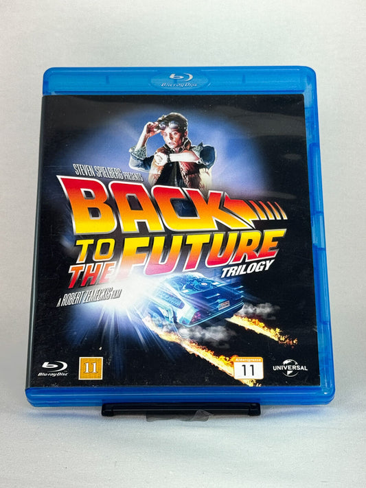 Forside av Blu-ray-cover til Back to the Future Trilogy – brukt klassisk sci-fi samleboks hos Brukbar Film