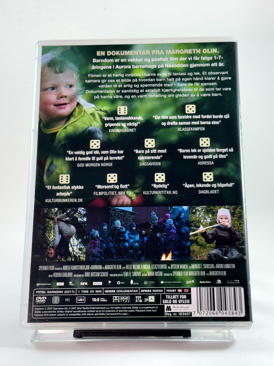 Bakside av DVD-cover til Barndom, brukt norsk dokumentar med prisomtaler hos Brukbar Film