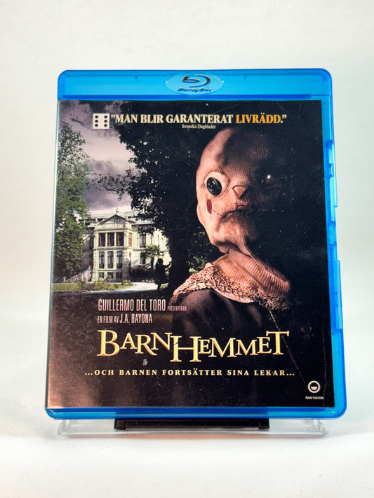 Forside av cover til Barnhemmet, brukt Blu-ray-utgivelse hos Brukbar Film