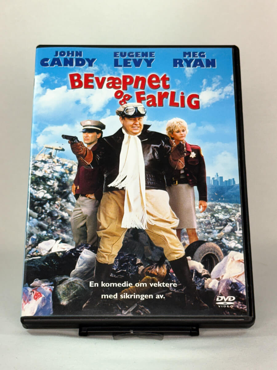 Forside av DVD-cover til Bevæpnet og farlig – brukt komedie på DVD med John Candy, Eugene Levy og Meg Ryan, original film hos Brukbar Film
