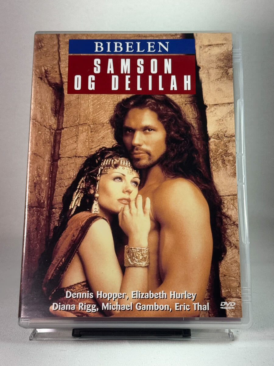 Forside av DVD-cover til Bibelen: Samson og Delilah – storslått fortelling om styrke og forræderi med Dennis Hopper og Elizabeth Hurley, brukt film hos Brukbar Film.