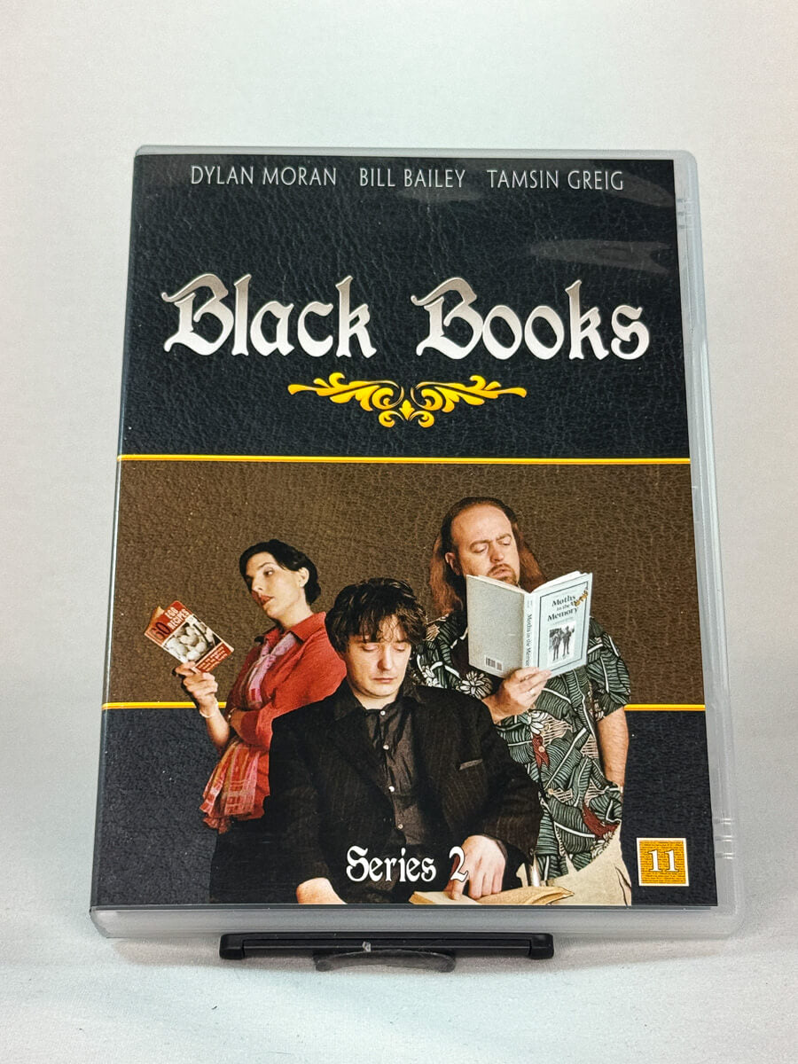 Forside av DVD-cover til Black Books – Series 2, populær britisk TV-serie – brukte DVD-filmer hos Brukbar Film