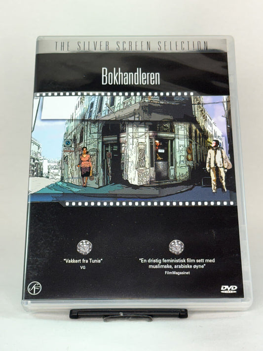 Forside av DVD-cover til Bokhandleren – prisbelønt tunisiskt drama om frihet, kultur og identitet, brukt DVD hos Brukbar Film.