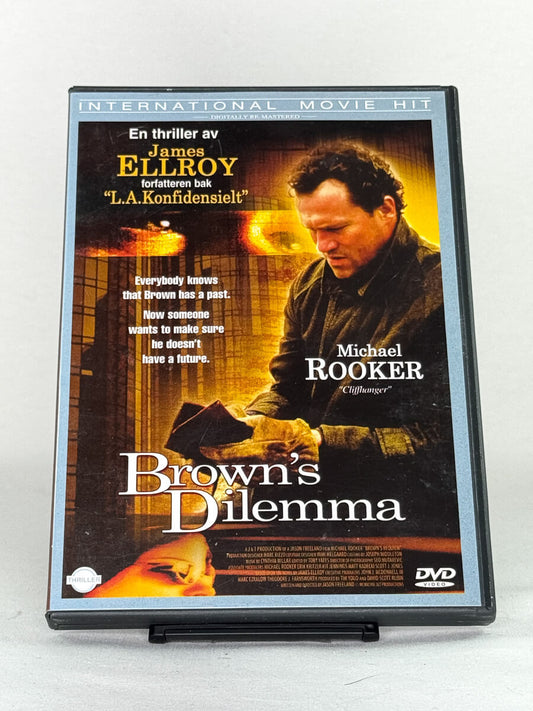 Forside av thrillerfilmen Brown’s Dilemma – basert på en historie av James Ellroy, med Michael Rooker, tilgjengelig hos Brukbar Film.