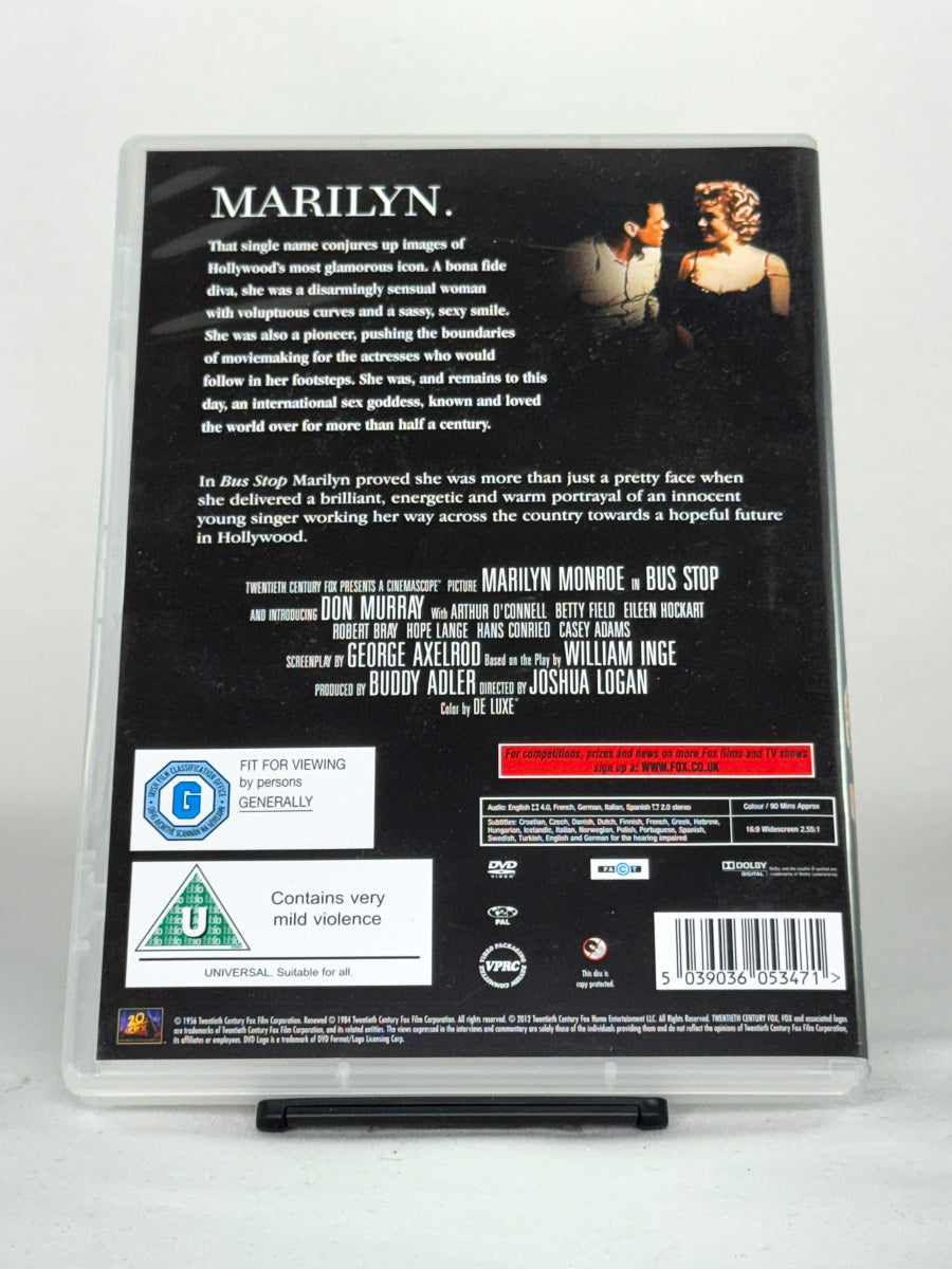 Bakside av DVD-cover for Bus Stop – brukt originalfilm; informasjon om skuespillere og spesifikasjoner.